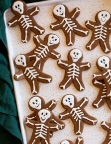 Creative Gingerbread Skeleton Cookies with Cheerful Designs for Festive Celebrations.