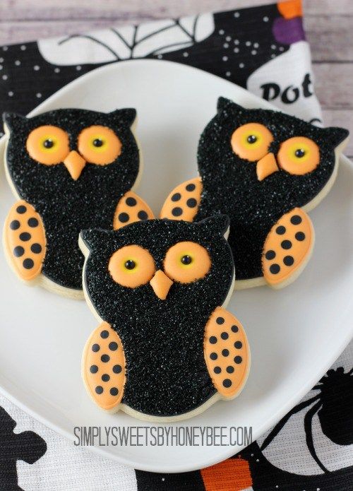 Whimsical Halloween Owl Cookies with Glossy Finish and Vibrant Accents.