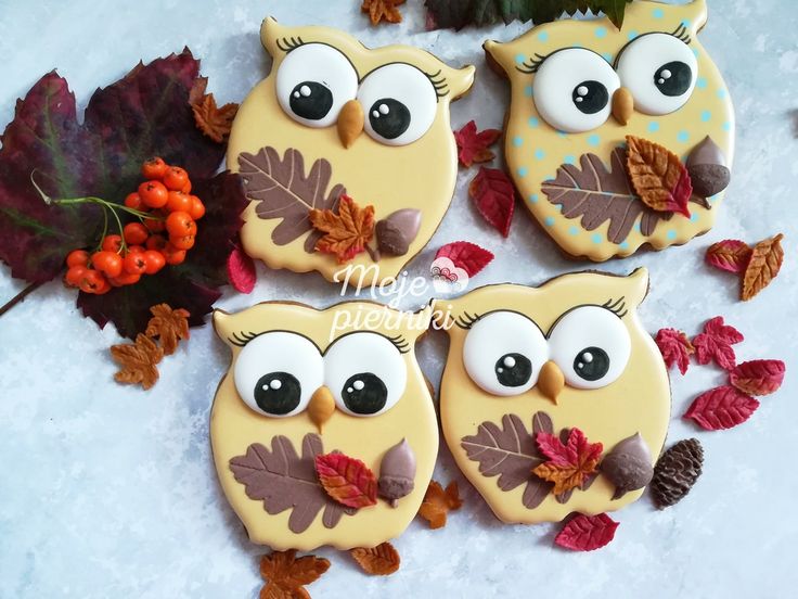 Whimsical Owl-Shaped Cookies with Colorful Autumn Leaves for Cozy Fall Gatherings.