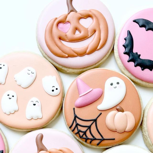 Festive Halloween Cookies with Playful Designs and Soft Pastel Colors.