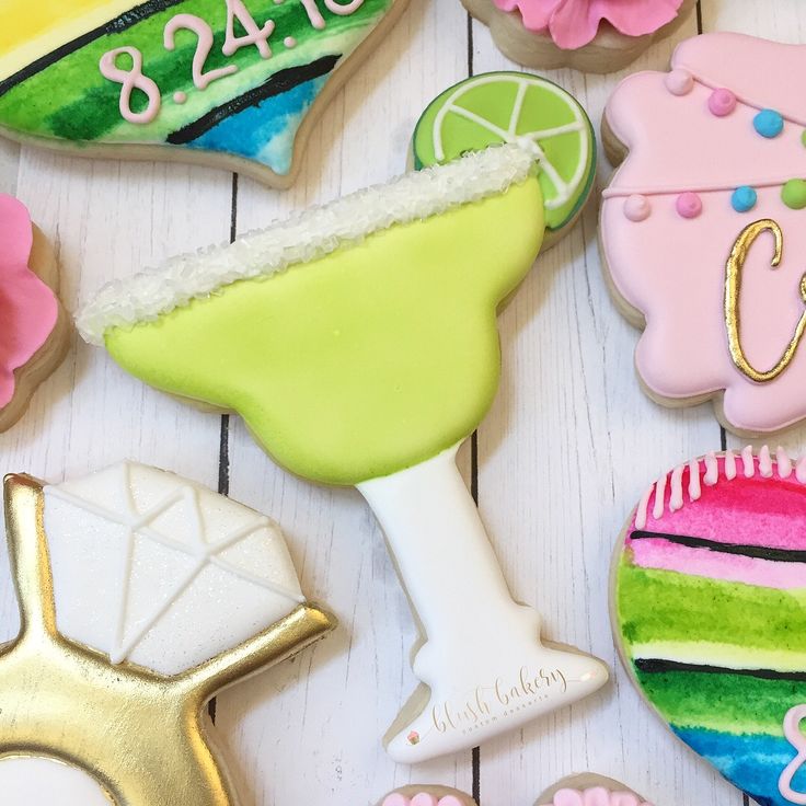 Festive Margarita-Shaped Cookies: Colorful Icing and Whimsical Details Delight.