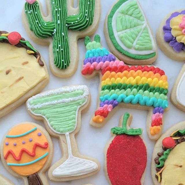 Playful Colorful Sugar Cookies with Festive Designs: Cactus, Donkey, and Margarita Motifs