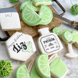 Vibrant Green Cookies: Festive Lime-Themed Designs for Birthday Celebrations.