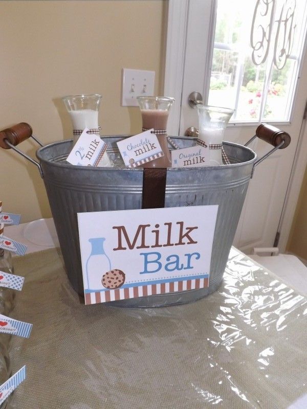 Charming Rustic Milk Bar with Galvanized Bucket and Vintage Glass Bottles for Casual Gatherings.