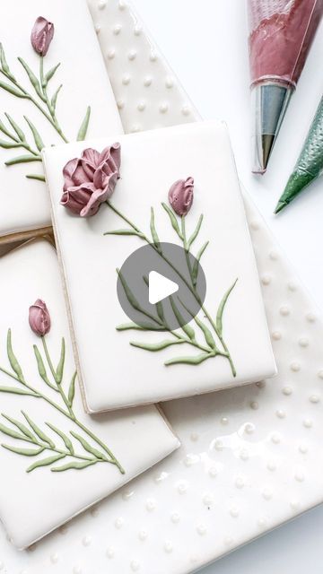 Beautifully Decorated Cookies Featuring Elegant Floral Designs and Intricate Piping Techniques