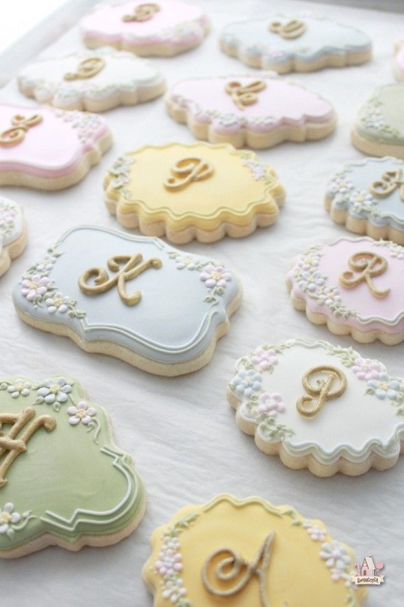 Whimsical Pastel Decorated Cookies with Intricate Floral Designs Perfect for Special Occasions.