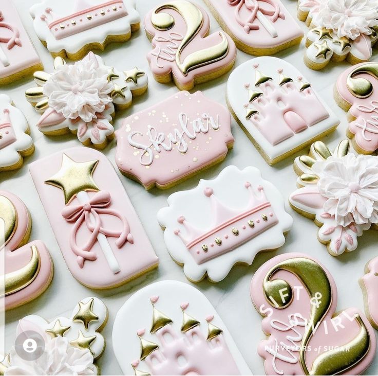 Whimsical Cookie Designs with Soft Pink Icing and Golden Accents.