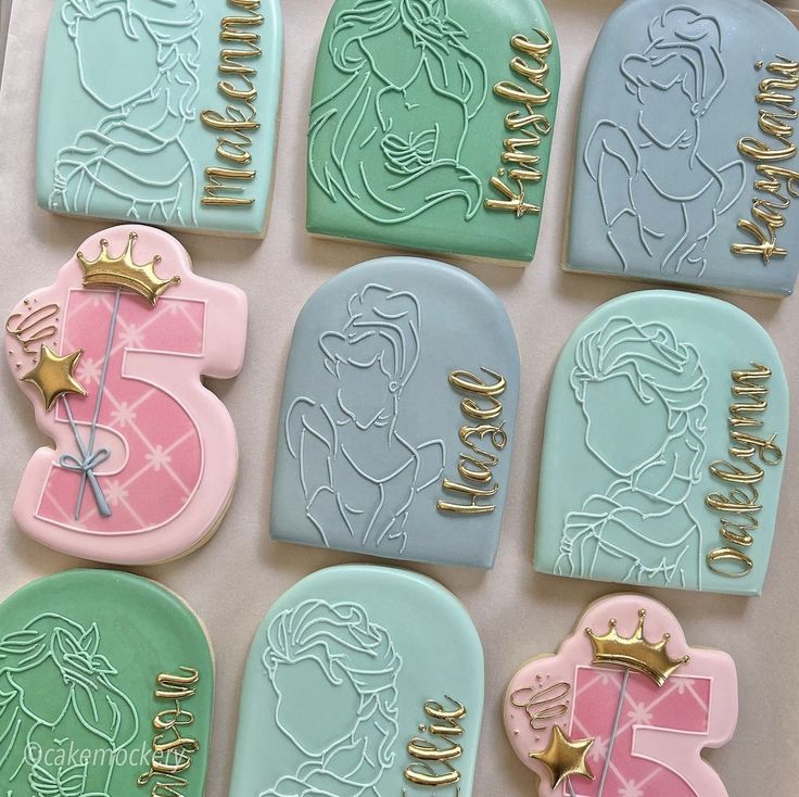 Whimsical Princess-themed Decorative Cookies in Soft Pastel Colors with Royal Motifs.