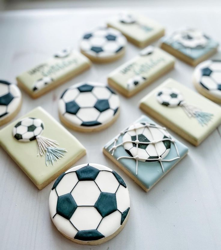 Playful Soccer-Themed Cookies with Intricate Icing and Vibrant Colors.