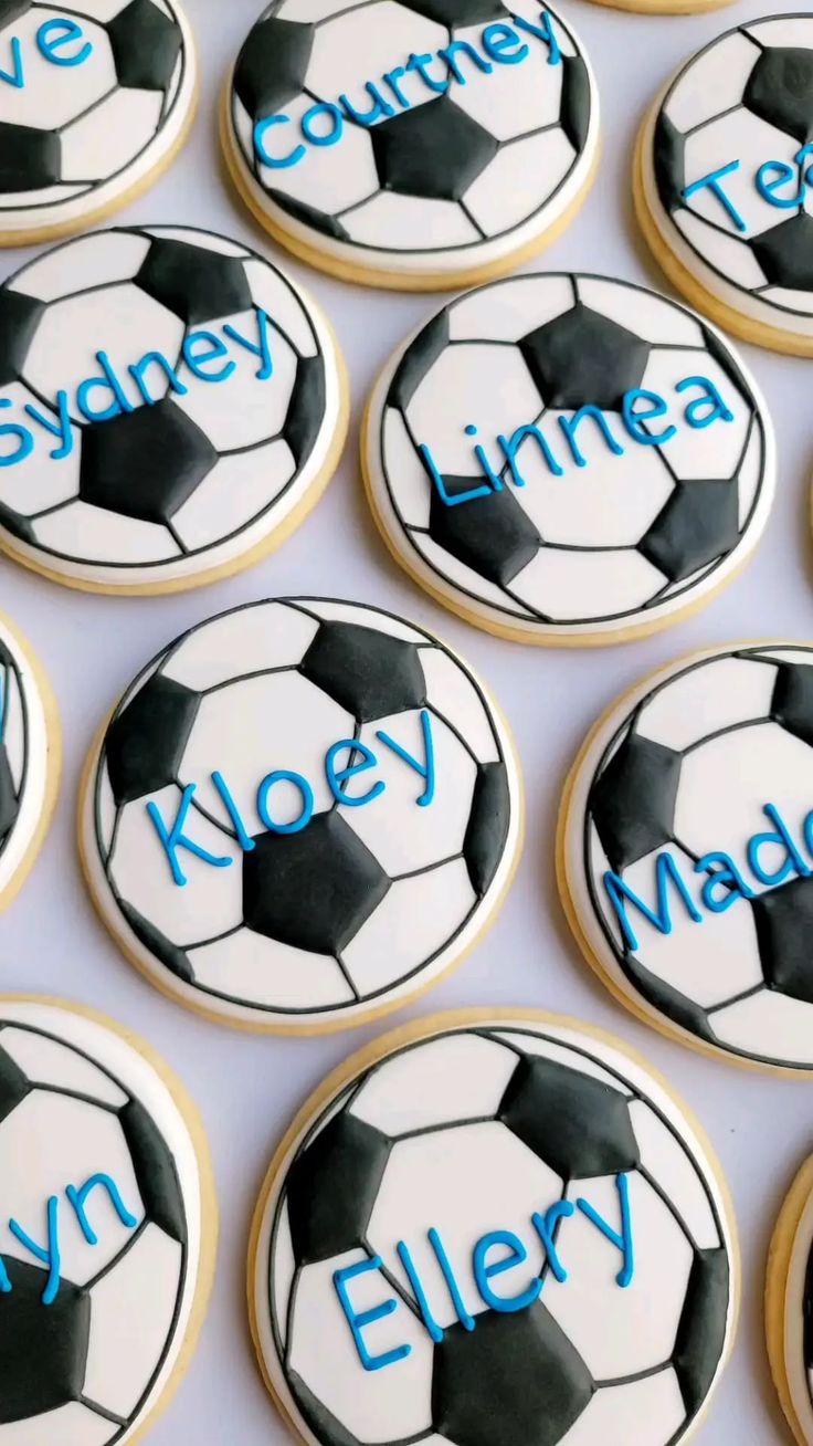 Soccer-Inspired Cookies with Classic Black and White Designs and Vibrant Blue Accents.