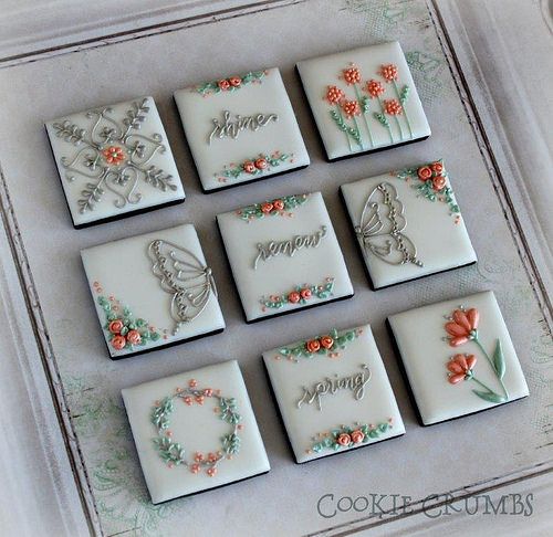 Charming Decorative Cookies with Intricate Floral Designs and Whimsical Motifs for Spring Celebrations.