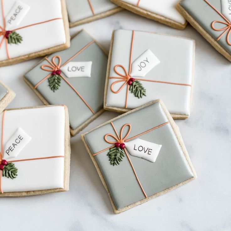 Elegant Holiday-Themed Decorative Cookies with Whimsical Icing Designs.