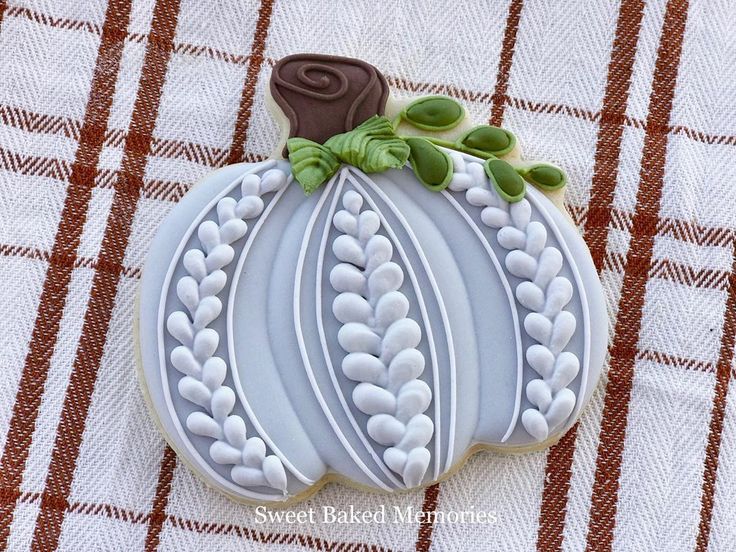 Sophisticated Pumpkin Cookie Design with Intricate Icing and Autumn Details