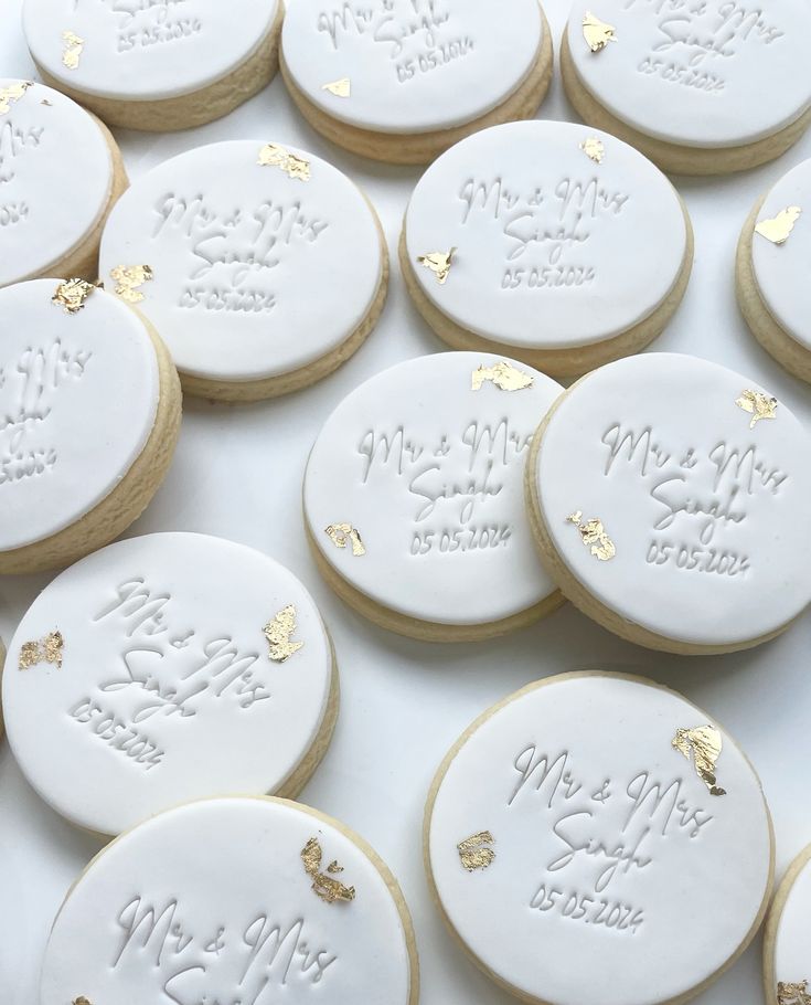 Sophisticated Wedding Cookies with Gold Accents and Personal Embossed Lettering.