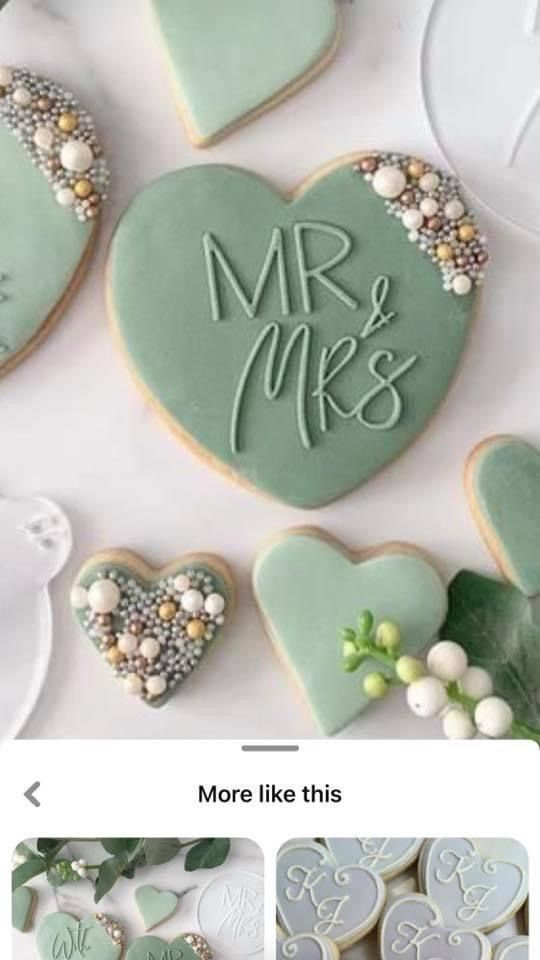 Elegant Heart-Shaped Cookies in Pastel Green with Decorative Beads and Romantic Script for Weddings and Celebrations.