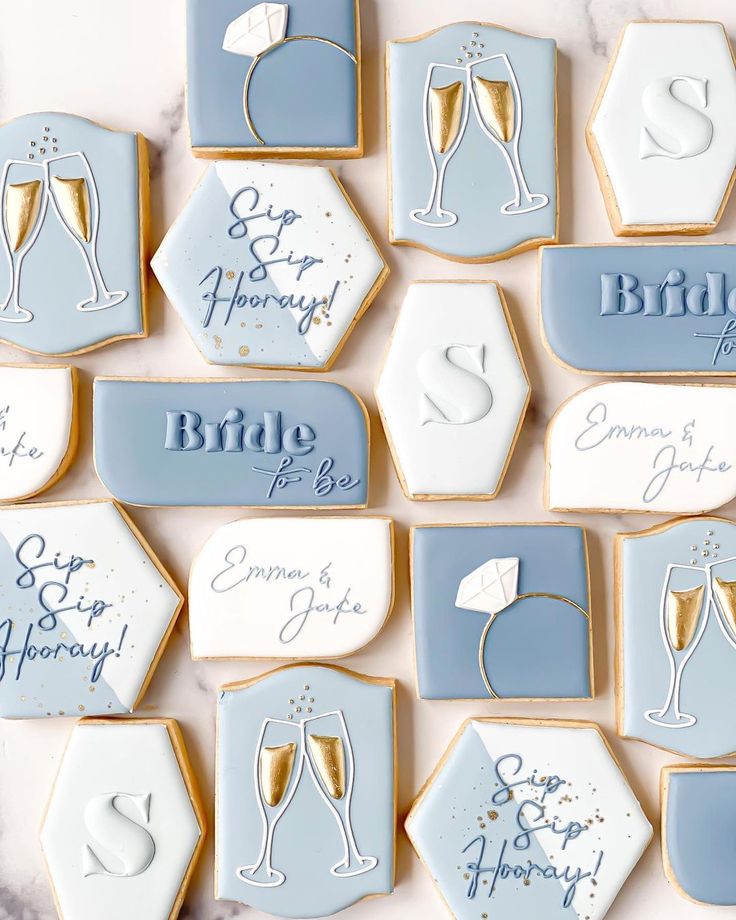 Elegant Bridal Cookie Designs with Soft Blues and Whites Enhance Celebration's Festive Atmosphere.