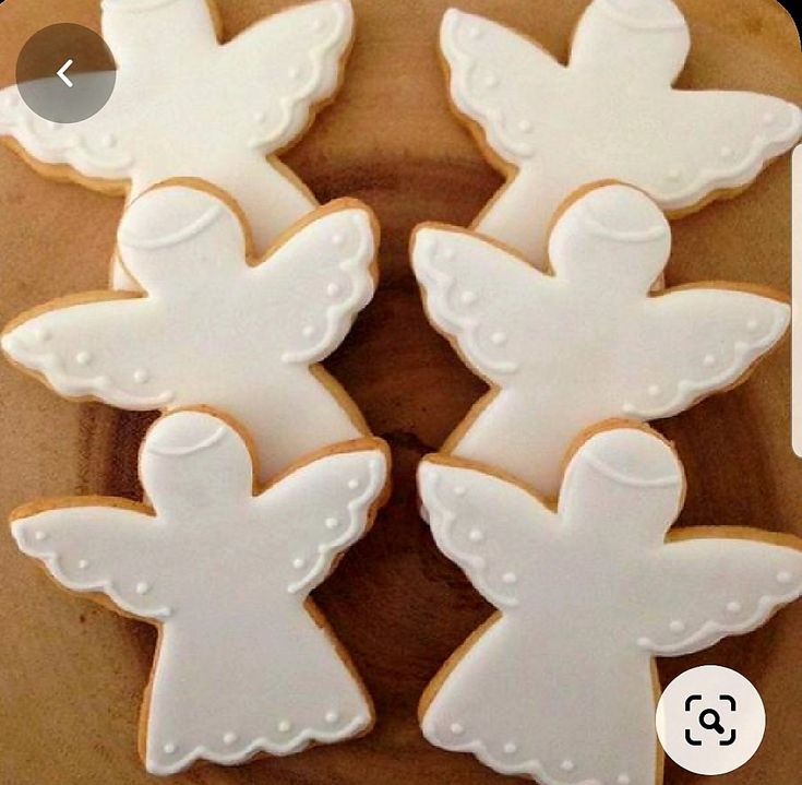 Whimsical Angel-Shaped Cookies with Elegant Icing for Festive Occasions