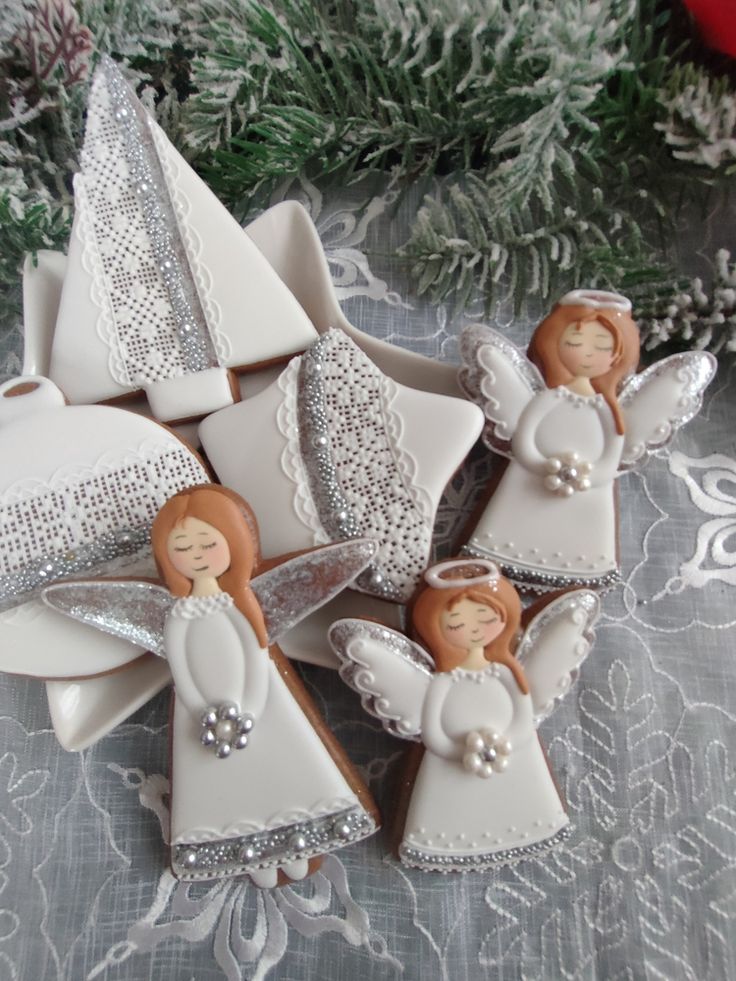 Angel-Inspired Decorative Cookies with Intricate Designs and Festive Charm.