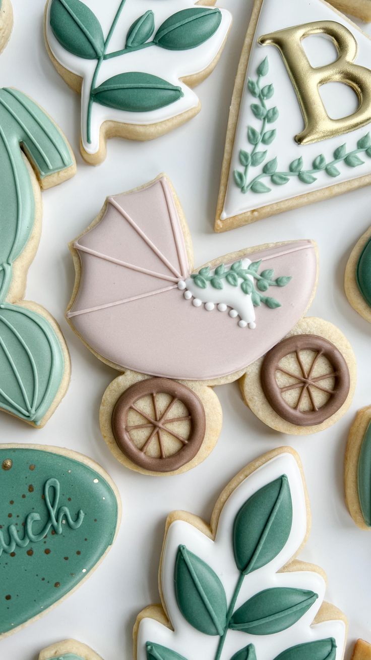 Elegant Pastel Sugar Cookies with Intricate Designs for Celebrations.