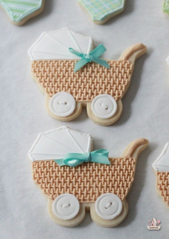 Charming Baby Stroller Cookies: Delightful Treats for Showers with Intricate Icing Details.