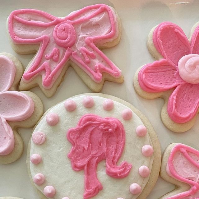 Playful Pink-Themed Cookie Designs with Whimsical Shapes and Frosting.