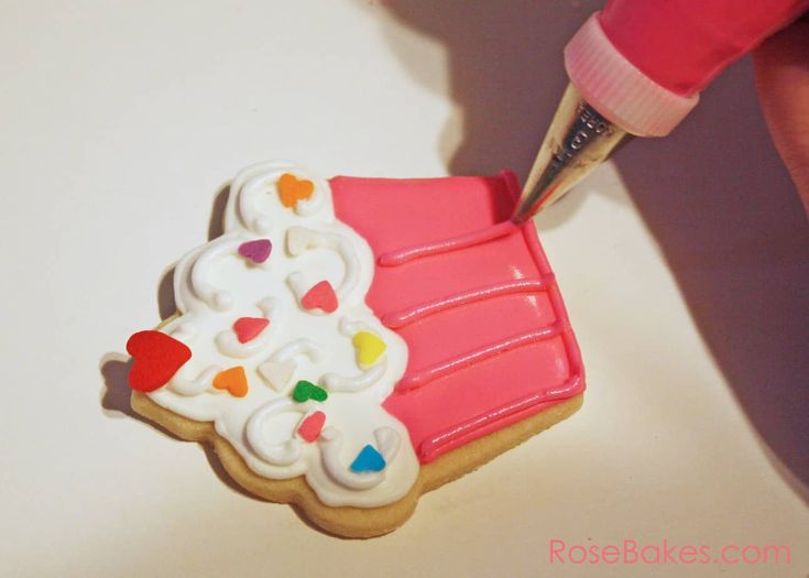 Whimsical Cupcake Cookie Design with Colorful Icing and Sprinkles.