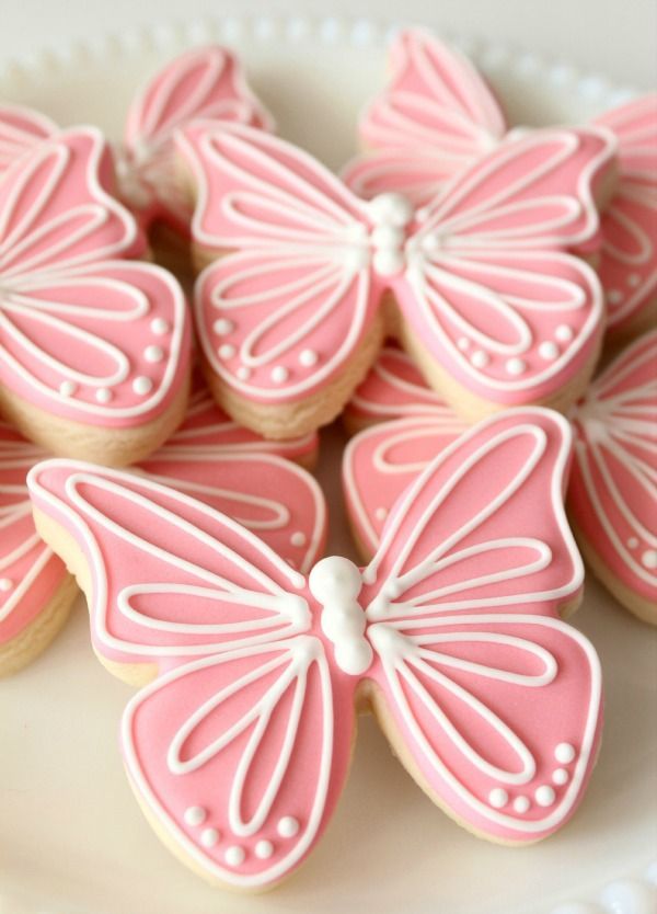 Whimsical Butterfly-Inspired Cookies and Nail Art Ideas in Pastel Colors.