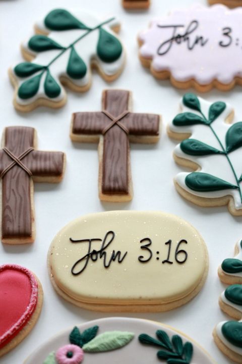 Festive Decorative Cookies Blending Religious Themes and Nature Motifs.