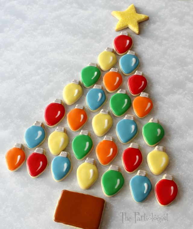 Festive Tree of Colorful Christmas Cookies Topped with a Bright Yellow Star.