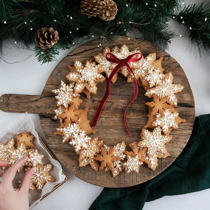 Festive Gingerbread Cookie Wreath with Intricate Icing and Cozy Holiday Decor