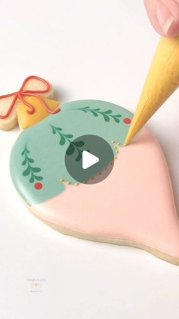 Festive Ornament-Shaped Cookie Design with Pastel Colors and Intricate Detailing.