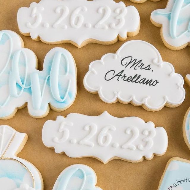 Whimsical Blue and White Decorated Cookies: Perfect for Weddings and Special Events.