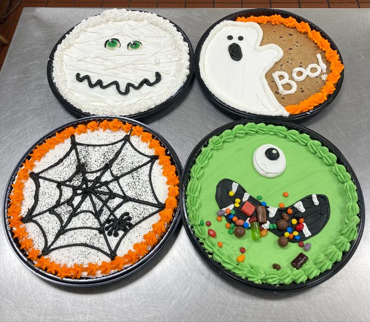 Festive Halloween-Themed Desserts with Creative Designs and Vibrant Decorations.