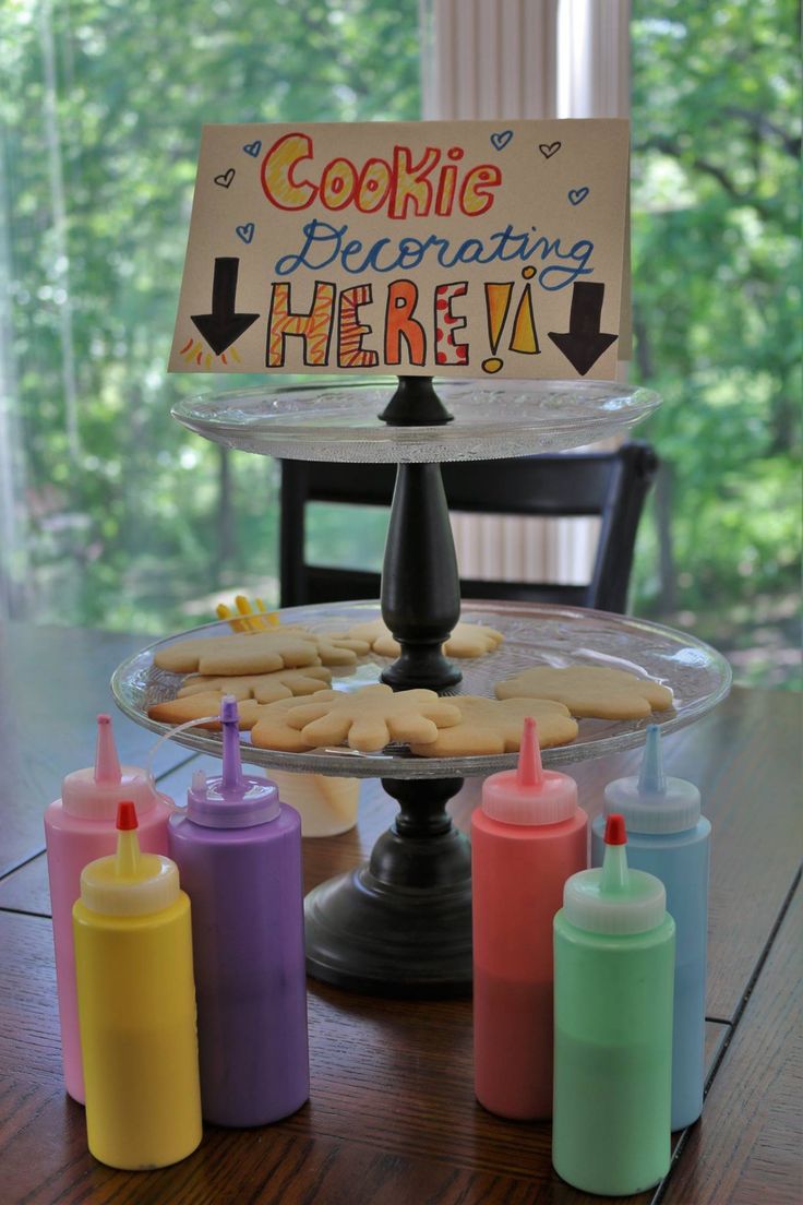 Vibrant Decorating Station: A Creative Setup for Icing Cookies at Parties.