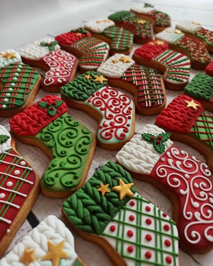 Intricately Decorated Festive Stocking Cookies in Vibrant Holiday Colors.