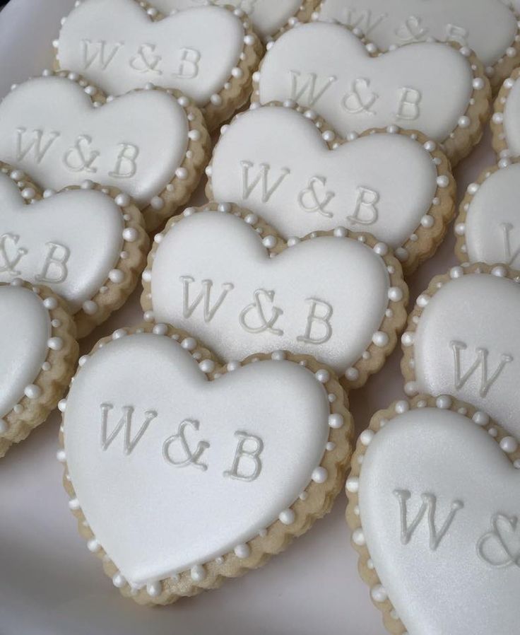 Elegant Heart-Shaped Cookies with Pearl Embellishments and Personalized Icing