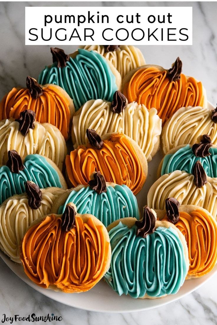 Vibrantly Decorated Pumpkin-Shaped Cookies Perfect for Autumn Celebrations.