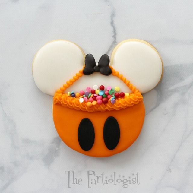 Playful Whimsical Cookie Design with Bright Orange Icing and Cheerful Accents.