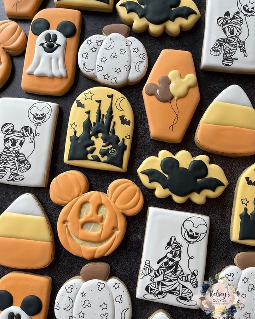 Festive Halloween Cookies: Whimsical Designs of Mickey Mouse, Pumpkins, Ghosts, and Bats