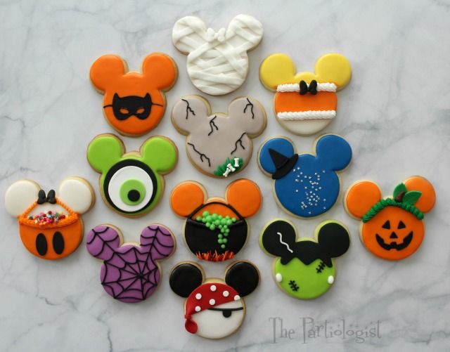 Whimsical Halloween Mickey Mouse Cookies with Spooky Designs.