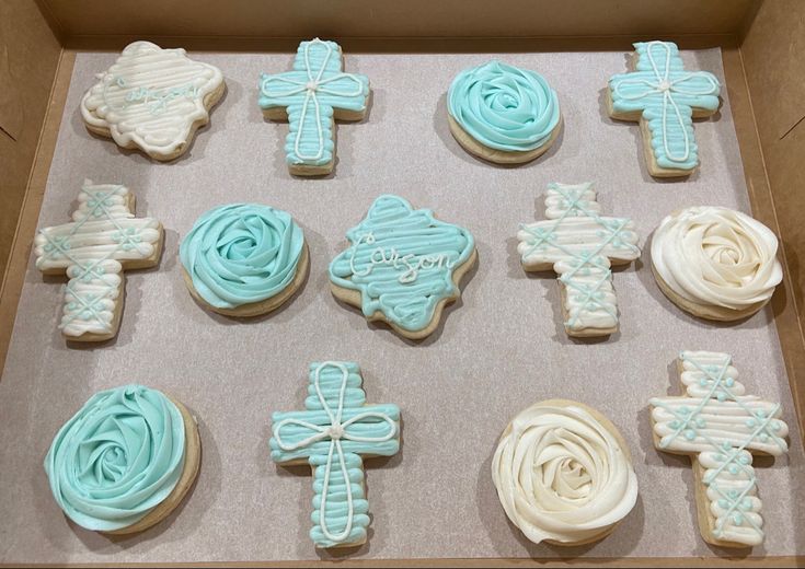 Elegant Aqua and Cream Decorative Sugar Cookies with Intricate Designs for Celebrations and Spiritual Occasions.