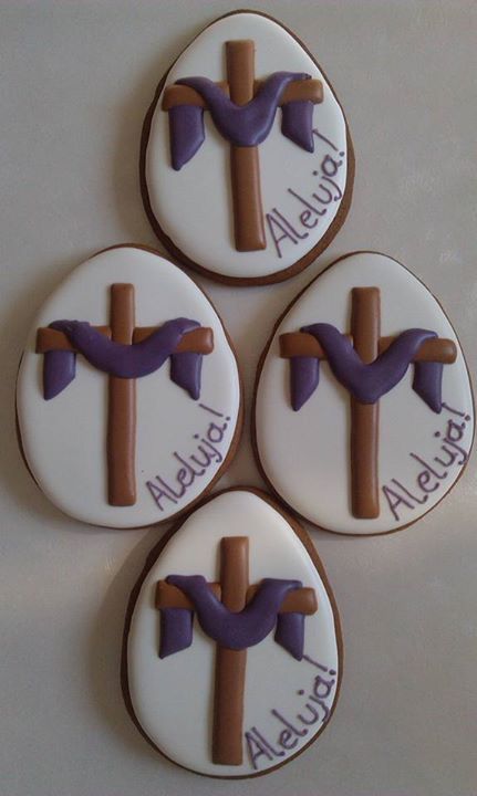 Festive Egg-Shaped Cookies with Intricate Cross Designs and Vibrant Icing