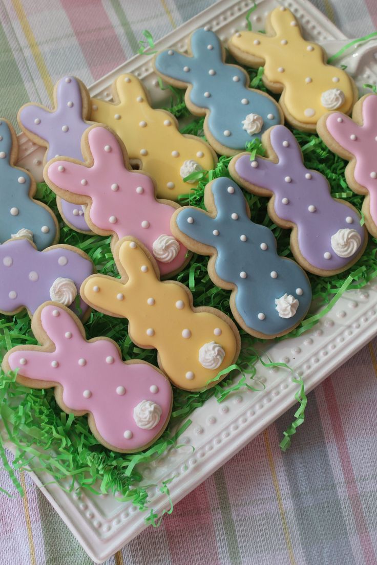 Whimsical Bunny-Shaped Cookies: Festively Decorated with Pastel Icing and Polka Dots.