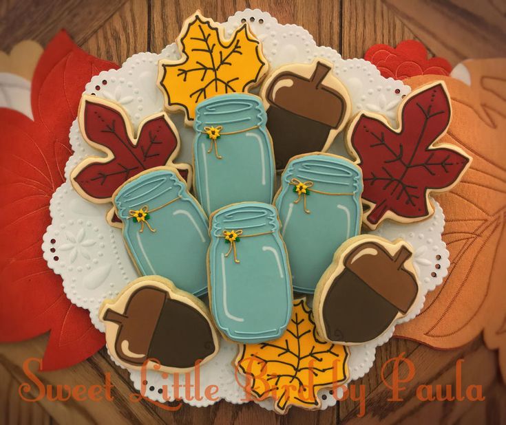 Cozy Autumn Cookies: Mason Jars, Acorns, and Colorful Leaves Celebrate the Season.