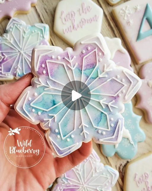 Whimsical Snowflake Cookie Design in Soft Pastels for Seasonal Celebrations.