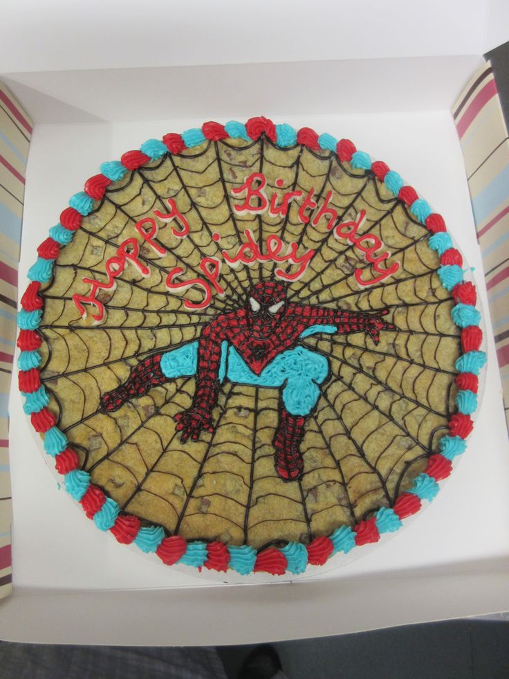 Whimsical Superhero Cookie Cake: A Vibrant Celebration Centerpiece.