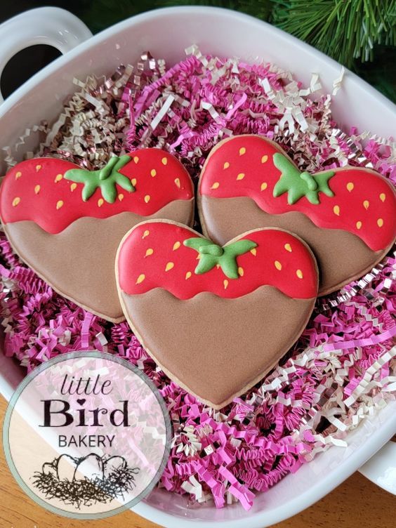 Whimsical Heart-Shaped Cookies with Chocolate-Strawberry Design Create a Festive Visual Delight.