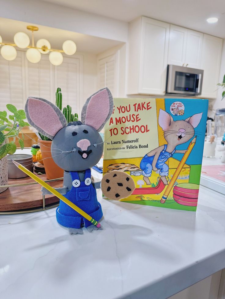 Charming Rabbit Figurine in Blue Overalls Enhances Creative Storytelling Theme.