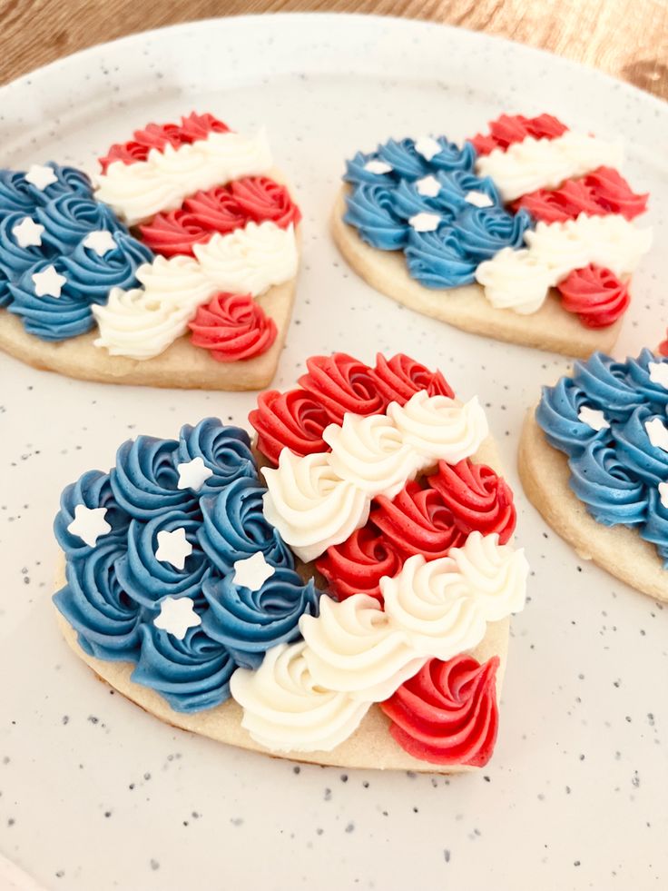 Festive Heart-Shaped Cookies with Patriotic Frosting Designs.