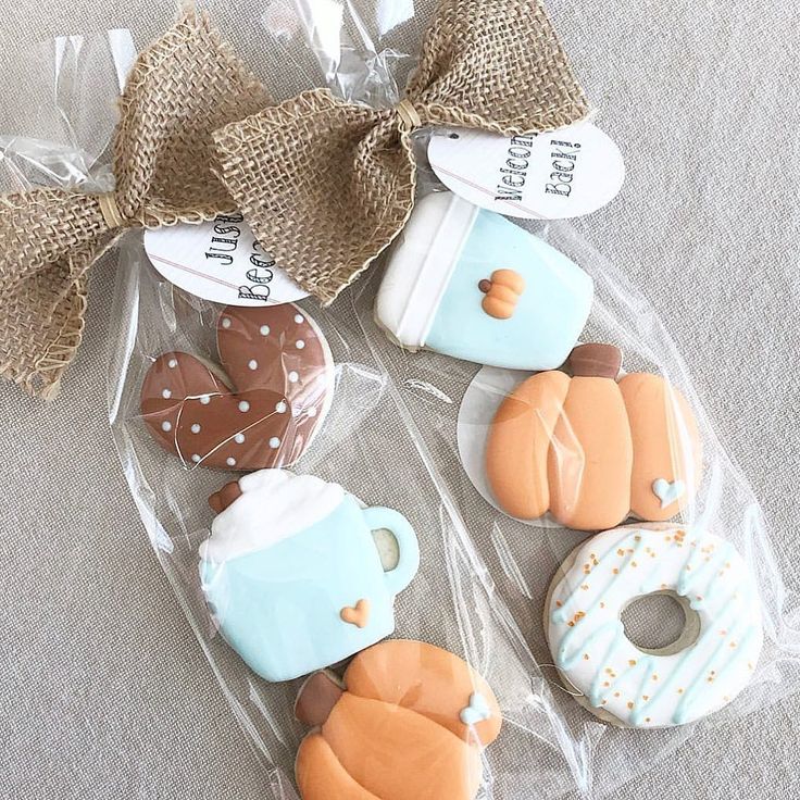 Charming Decorative Cookie Packages with Delightful Pastel Designs and Rustic Wrapping.